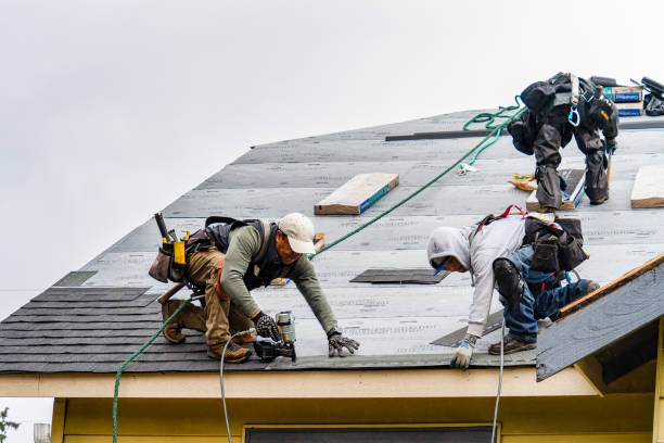 Professional Gutter Installation technician working in Keller, WA